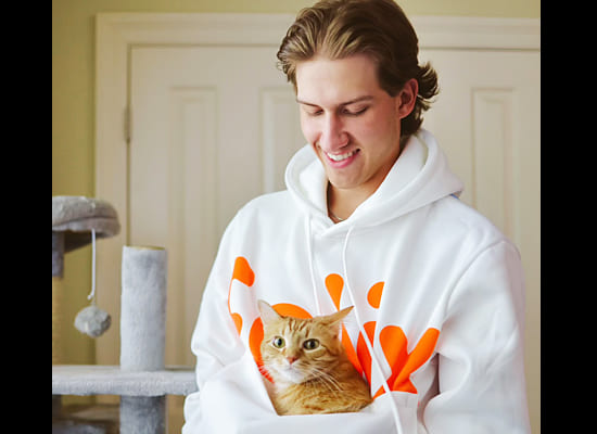 Abram Engle & Kurt in their limited-edition cat dad hoodies by Felix Cat Insurance on Pet Life Radio
